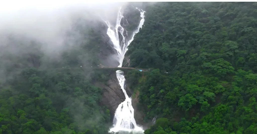 Majestic four-tiered Dudhsagar Falls cascading through Western Ghats
