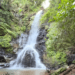 Pali Waterfall Goa with sacred natural Shivling formation during monsoon season,