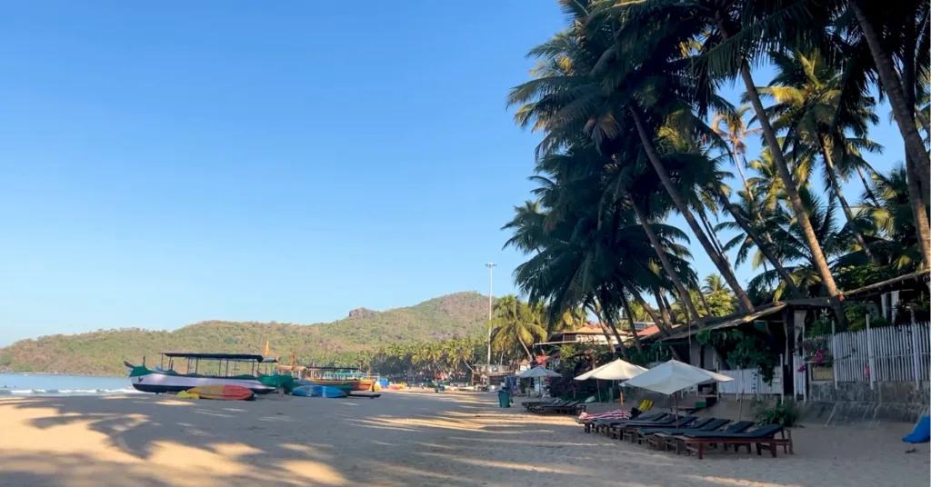Calm waters and beachfront restaurants at Palolem Beach, South Goa's paradise cove